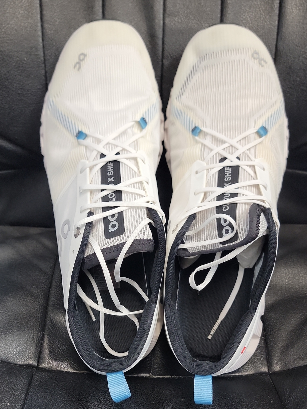 On Running Men's Athletic Shoes — White with Light Blue Accents